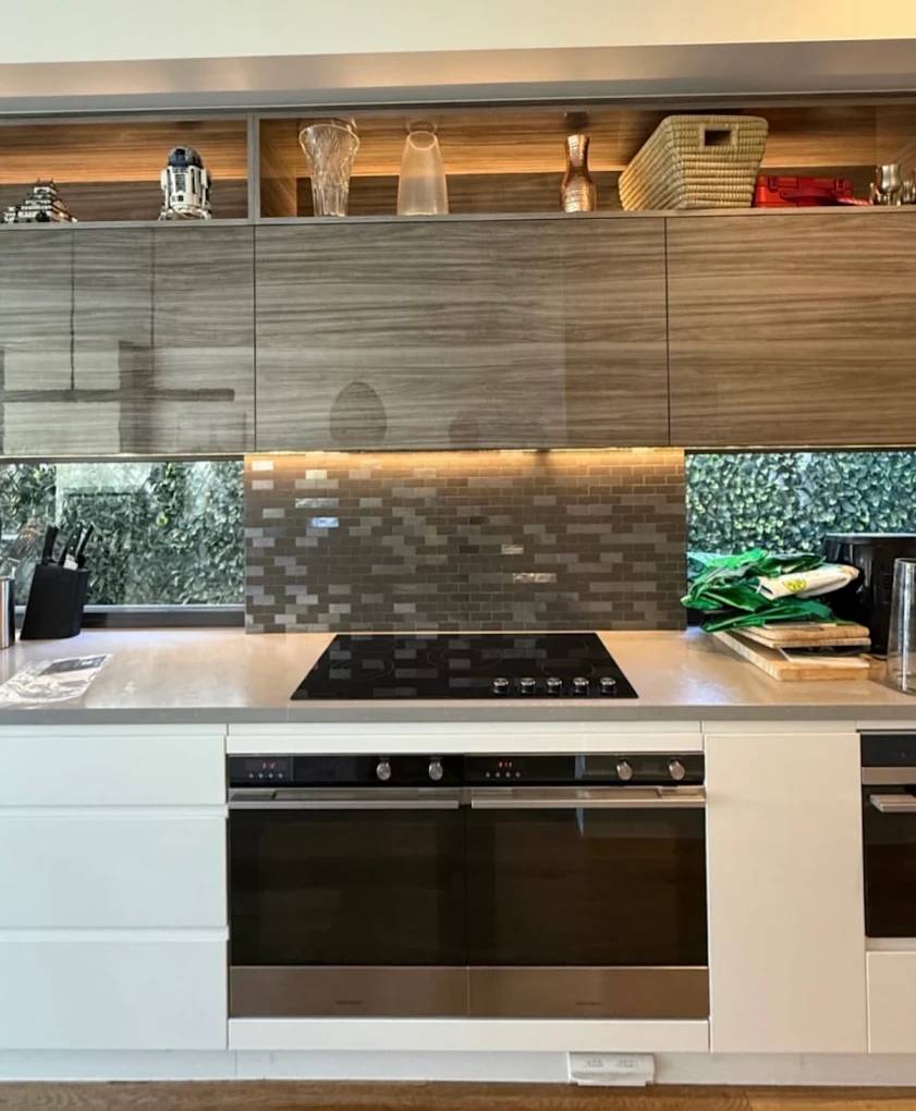 A new oven fitted into the kitchen cabinet, one of our installs