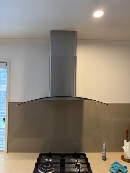 A new rangehood installed over the cooktop