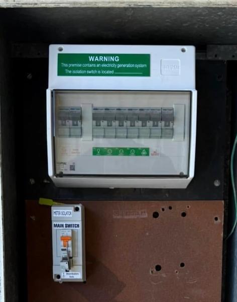 An upgraded switchboard with new circuit breakers and safety switches